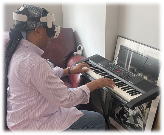 Veteran using VR headset at piano